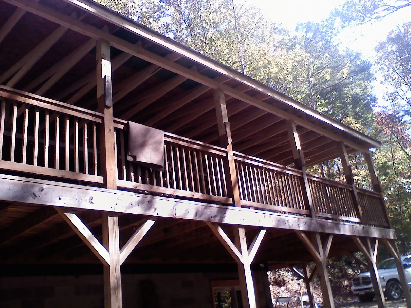 Timber framing under a new elevated porch and deck — Roof Leak Repair in Fallsburg by Roofing Brothers